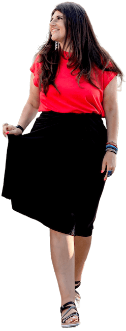 Image of Rachel Rofé walking wearing a red shirt and black dress.